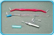 Photograph showing several types of interdental brushes.