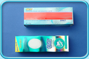 Photograph of two different brands of anti-calculus toothpaste.