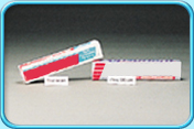 Photograph of two different brands of anti-plaque toothpaste.