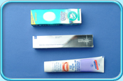 Photograph of different brands of whitening toothpaste.