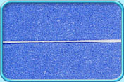 Photograph of a piece of thin round floss.