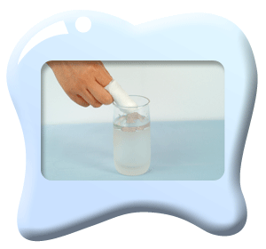 Photograph of damping a finger wrapped in gauze with water.