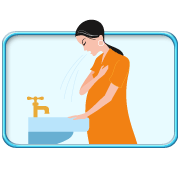 圖中所見是一位孕婦對著洗手盆想要嘔吐的樣子。
